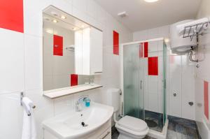 Kúpeľňa v ubytovaní Carpe Diem Apartments + 36 fotografií