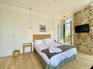 Posteľ alebo postele v izbe v ubytovaní Mirandoalaconcha Rooms