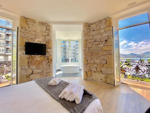 Posteľ alebo postele v izbe v ubytovaní Mirandoalaconcha Rooms