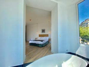 Posteľ alebo postele v izbe v ubytovaní Mirandoalaconcha Rooms