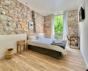 Posteľ alebo postele v izbe v ubytovaní Mirandoalaconcha Rooms