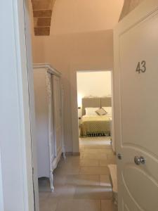 Postel nebo postele na pokoji v ubytování PLAZACARRISI HOTEL & SPA