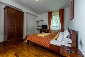 Voodi või voodid majutusasutuse Hotel Sunce Vlašić toas