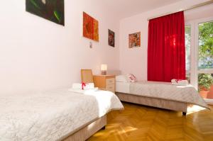 Postel nebo postele na pokoji v ubytování Apartment Red Orange