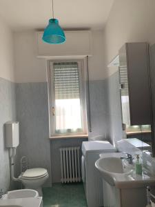 Kúpeľňa v ubytovaní Asti Apartment