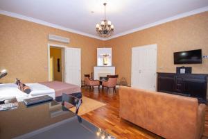 TV a/nebo společenská místnost v ubytování SKARITZ Hotel & Residence