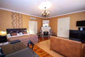 Postel nebo postele na pokoji v ubytování SKARITZ Hotel & Residence