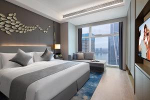 Postelja oz. postelje v sobi nastanitve Ascott Xiangjiang FFC Changsha