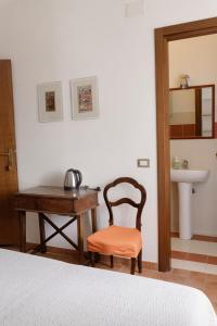 Ένα ή περισσότερα κρεβάτια σε δωμάτιο στο Agriturismo Germogli I Tenuta di Fassia +67 φωτογραφίες