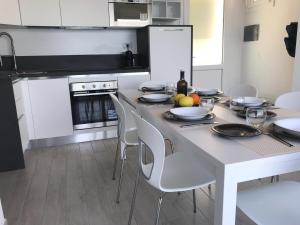 A kitchen or kitchenette at La dolce vita , fronte mare