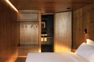Postel nebo postele na pokoji v ubytování Zero Box Lodge Coimbra
