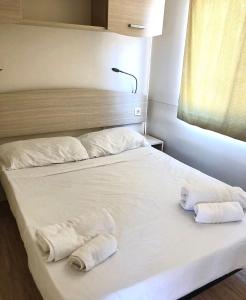 Posteľ alebo postele v izbe v ubytovaní Camping Village Nice Garden