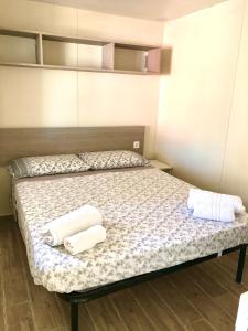 Posteľ alebo postele v izbe v ubytovaní Camping Village Nice Garden