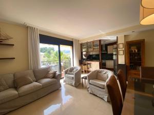 Posezení v ubytování LLOGUER30 Los delfines, swimming pools , near the beach and with parking