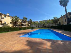 Bazén v ubytování LLOGUER30 Los delfines, swimming pools , near the beach and with parking nebo v jeho okolí