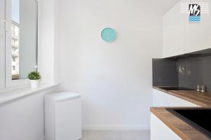 Kuchyňa alebo kuchynka v ubytovaní MS Apartments Kopernicus II