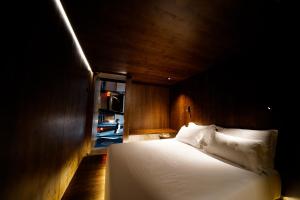 Postel nebo postele na pokoji v ubytování Zero Box Lodge Coimbra