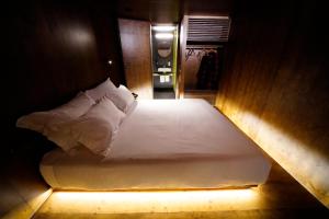 Postel nebo postele na pokoji v ubytování Zero Box Lodge Coimbra