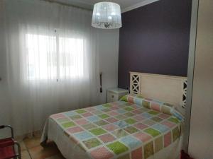 Postel nebo postele na pokoji v ubytování Zona Centro II Orangecosta