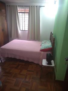 Letto o letti in una camera di Pousada Santa Felicidade Trieste D