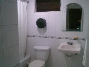 Koupelna v ubytování Apartahotel Jardines Metropolitanos