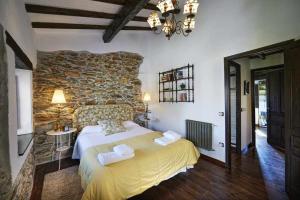 A bed or beds in a room at Casa La Palomba