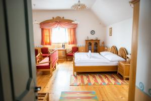 Postel nebo postele na pokoji v ubytování Libušín & Maměnka národní kulturní památky