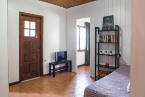 Postel nebo postele na pokoji v ubytování Alice House