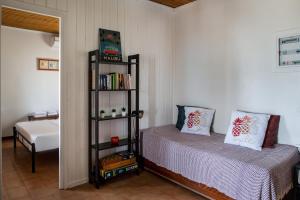 Postel nebo postele na pokoji v ubytování Alice House