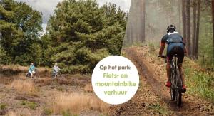a man riding a bike down a dirt trail at Pop-up glamping - Buurvrouws' Belltentje 2-4 pers in Zuna