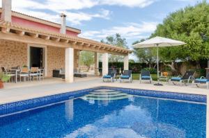 The swimming pool at or close to YourHouse Can Cuixa Villa