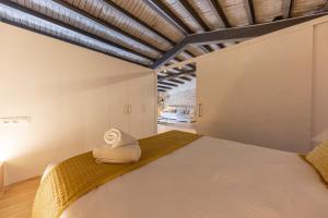 Posteľ alebo postele v izbe v ubytovaní Bravissimo Plaça del Vi, Design Penthouse