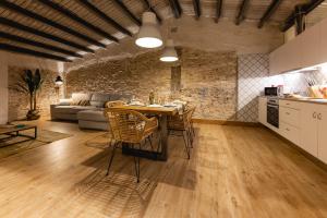 Kuchyňa alebo kuchynka v ubytovaní Bravissimo Plaça del Vi, Design Penthouse