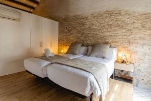 Posteľ alebo postele v izbe v ubytovaní Bravissimo Plaça del Vi, Design Penthouse