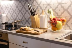 Kuchyňa alebo kuchynka v ubytovaní Bravissimo Plaça del Vi, Design Penthouse