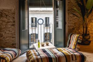 Posteľ alebo postele v izbe v ubytovaní Bravissimo Plaça del Vi, Design Penthouse