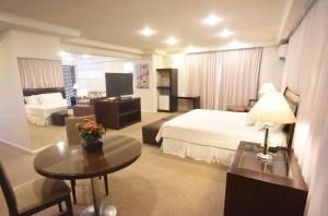 Postel nebo postele na pokoji v ubytování Central Park Hotel by Bourbon + 37 fotografií