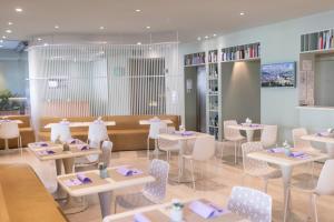 Posezení v ubytování Aromi Piccolo Hotel