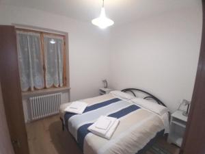 Posteľ alebo postele v izbe v ubytovaní Casa Piva