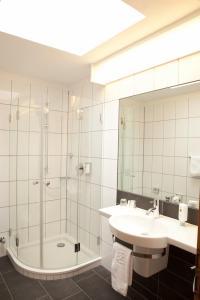 Ein Badezimmer in der Unterkunft Akzent Hotel Deutsche Eiche