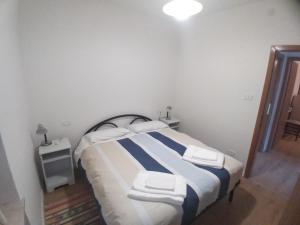 Posteľ alebo postele v izbe v ubytovaní Casa Piva