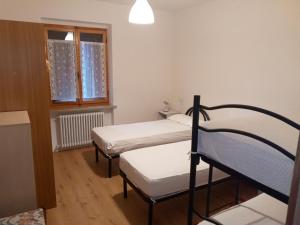 Posteľ alebo postele v izbe v ubytovaní Casa Piva