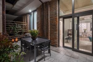 A balcony or terrace at Fornace Loft with Dependance R&R