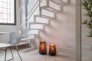 A seating area at Fornace Loft with Dependance R&R