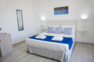 Katil atau katil-katil dalam bilik di B&b Suddenna