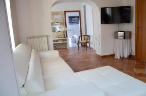 Televisyen dan/atau pusat hiburan di Cozy apartment in Caltagirone - 70 m² with balcony