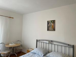 Postel nebo postele na pokoji v ubytování Guesthouse Tariba