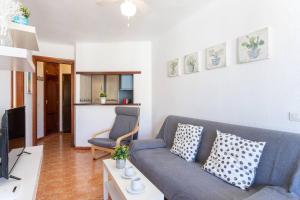 Televiisor ja/või meelelahutuskeskus majutusasutuses Apartamento Torrox Playa Solset