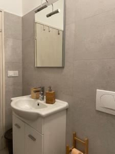 Koupelna v ubytování Guesthouse Tariba + 37 fotografií