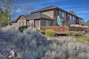 a house with a landscaping in front of it at Redmond Resort Townhome w/ Private Hot Tub in Redmond